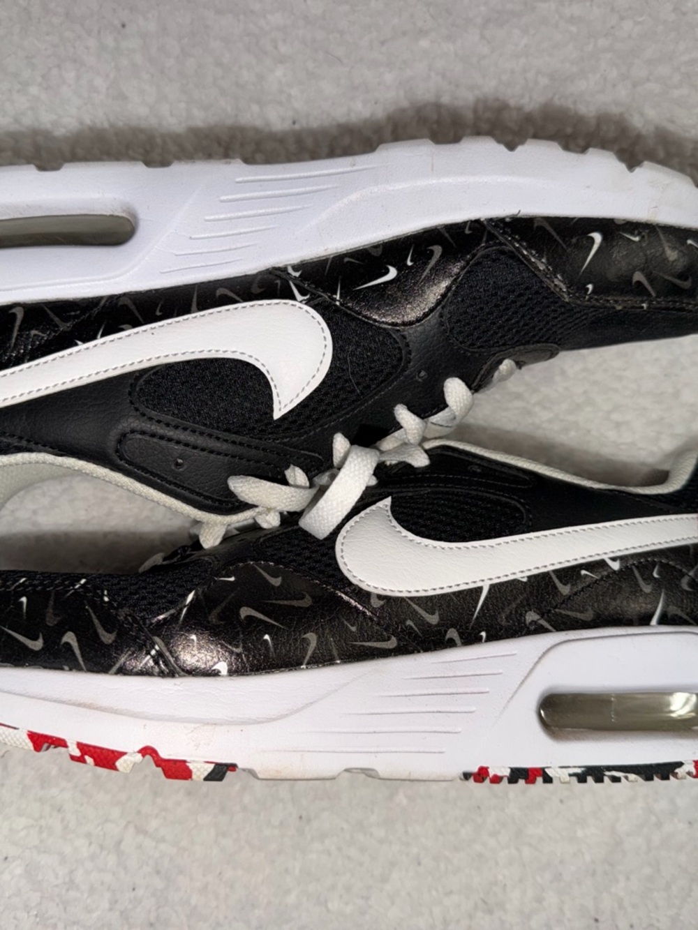 Nike Black White Athletic Sneakers with Red Outsole Accents